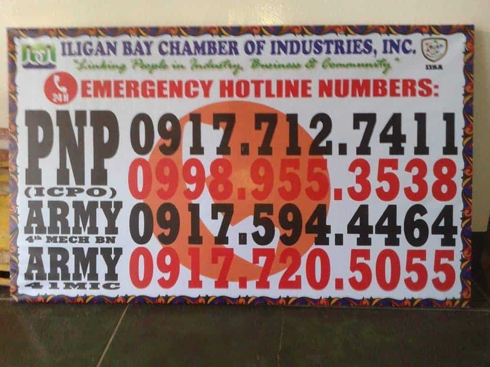 Emergency iligan hotline numbers for PNP and ARMY in bold text on a white board with colored accents.
