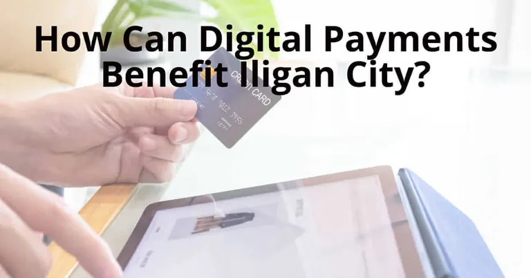 Person using credit card on tablet; asks how digital payments are boosting Iligans economy.