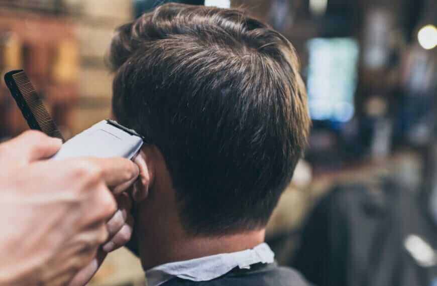 close up of a stylish haircut with clippers in an iligan barbershop, focusing on the back of the head.