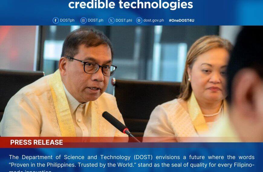 two dost officials, in formal barong tagalog, discuss filipino innovations at a press conference table.