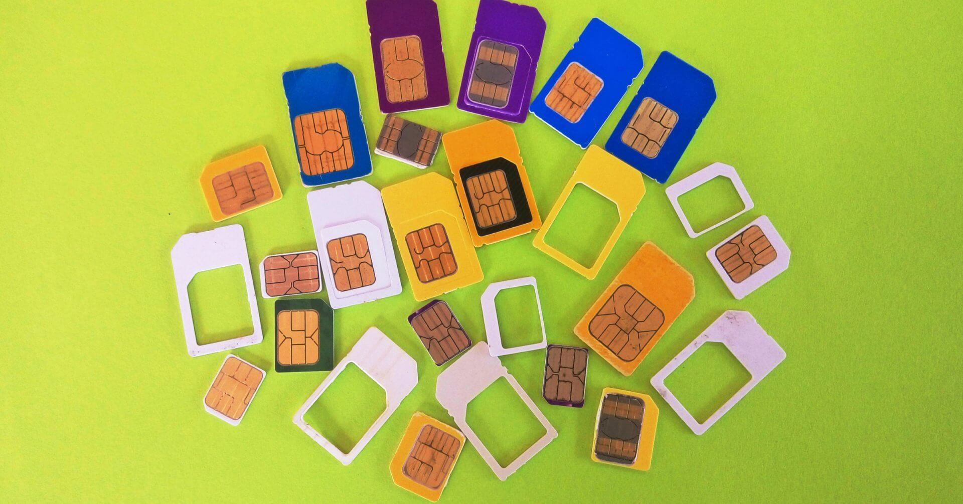 various sim cards and frames on a green background, perfect for those looking to buy sim in iligan city.