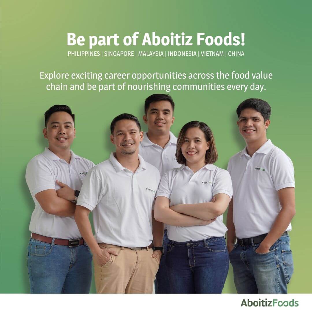 five people in white polos smile together under the aboitiz foods text, highlighting career opportunities.
